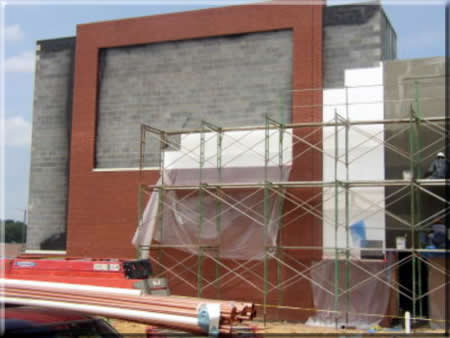 Stucco project building front